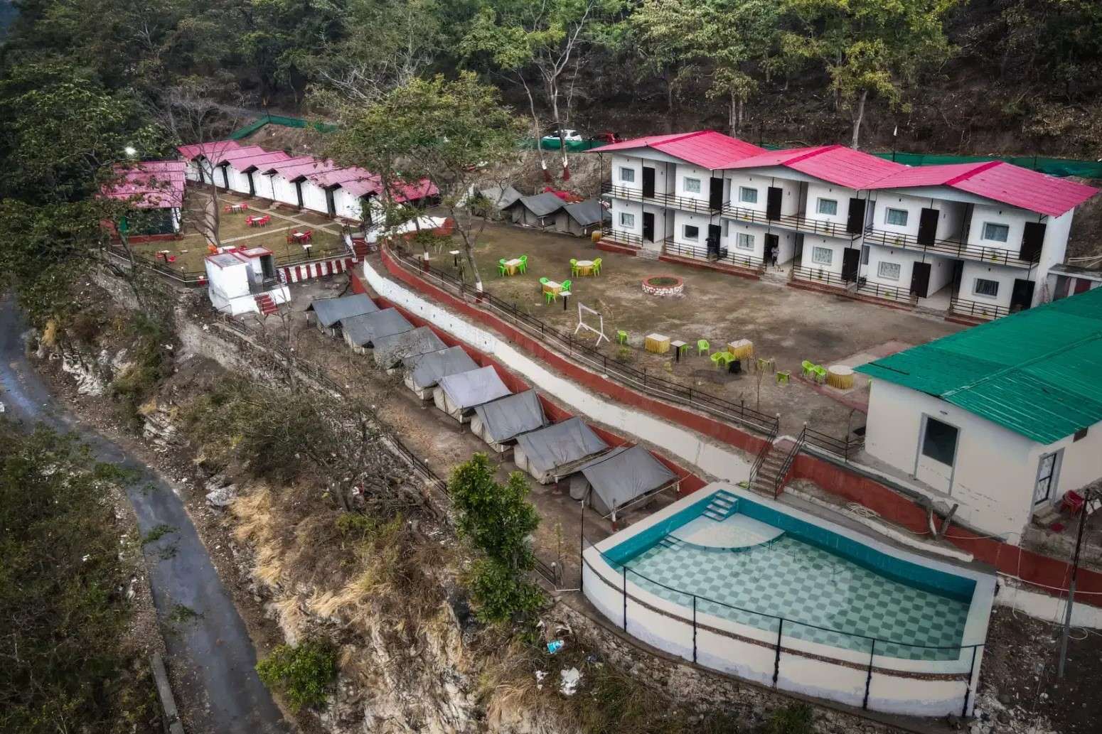 Enjoy riverside camping with cozy tents, activities, and scenic views