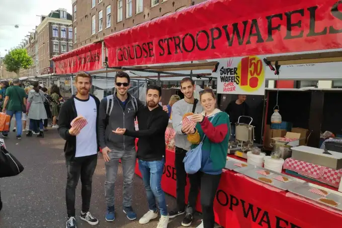 Embark on a food walking tour in the Albert Cuyp Market in Amsterdam