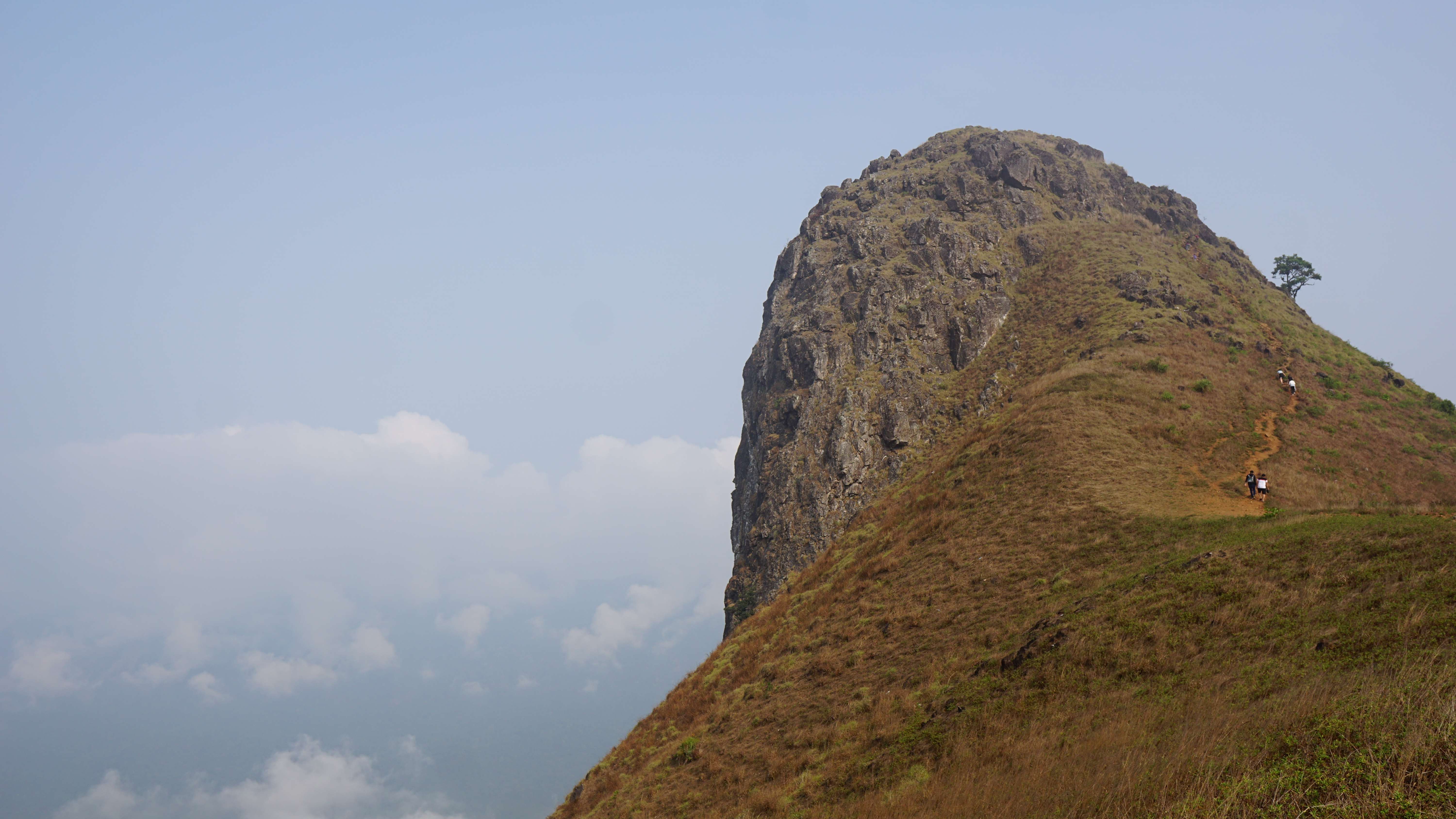 Embark on an adventurous trek to the iconic 'Ox's Shoulder' peak