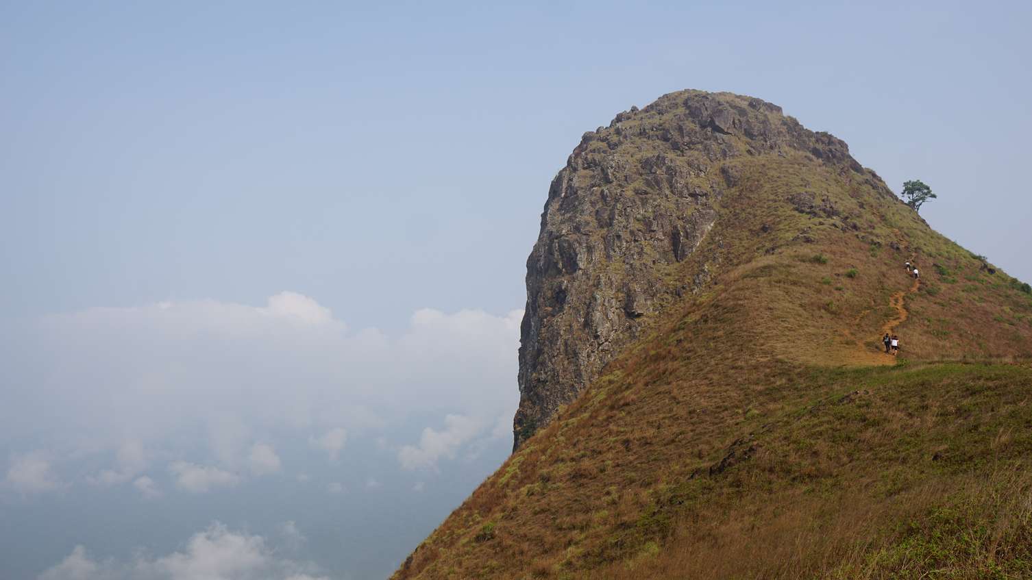 Embark on an adventurous trek to the iconic 'Ox's Shoulder' peak