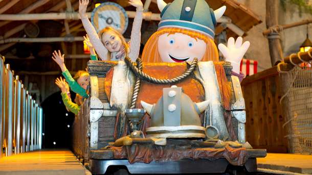 Hop on the exciting Wickiebaan roller coaster at famous Plopsa Indoor Hasselt Park