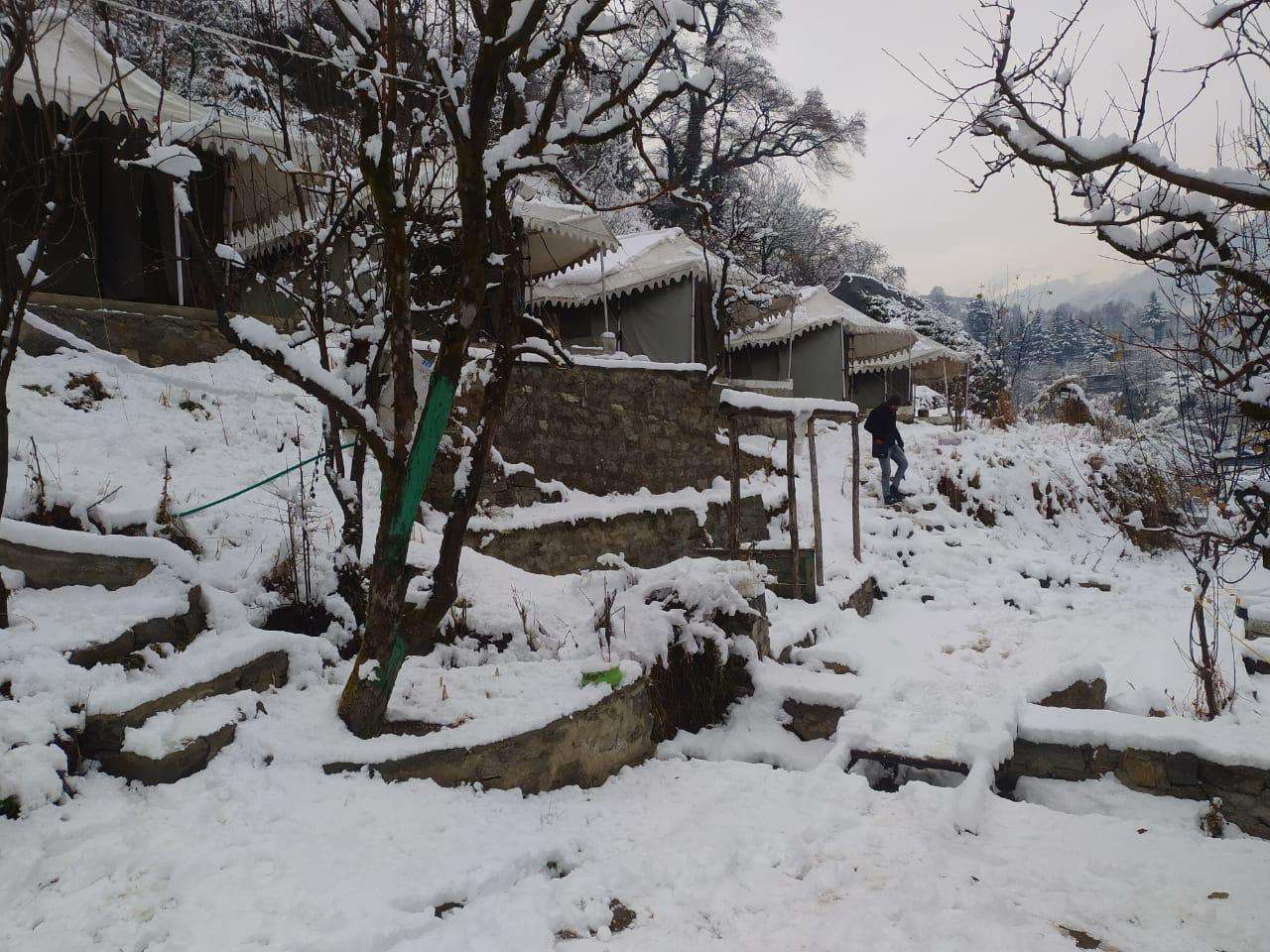 Riverside Camping Rafting and Paragliding Image