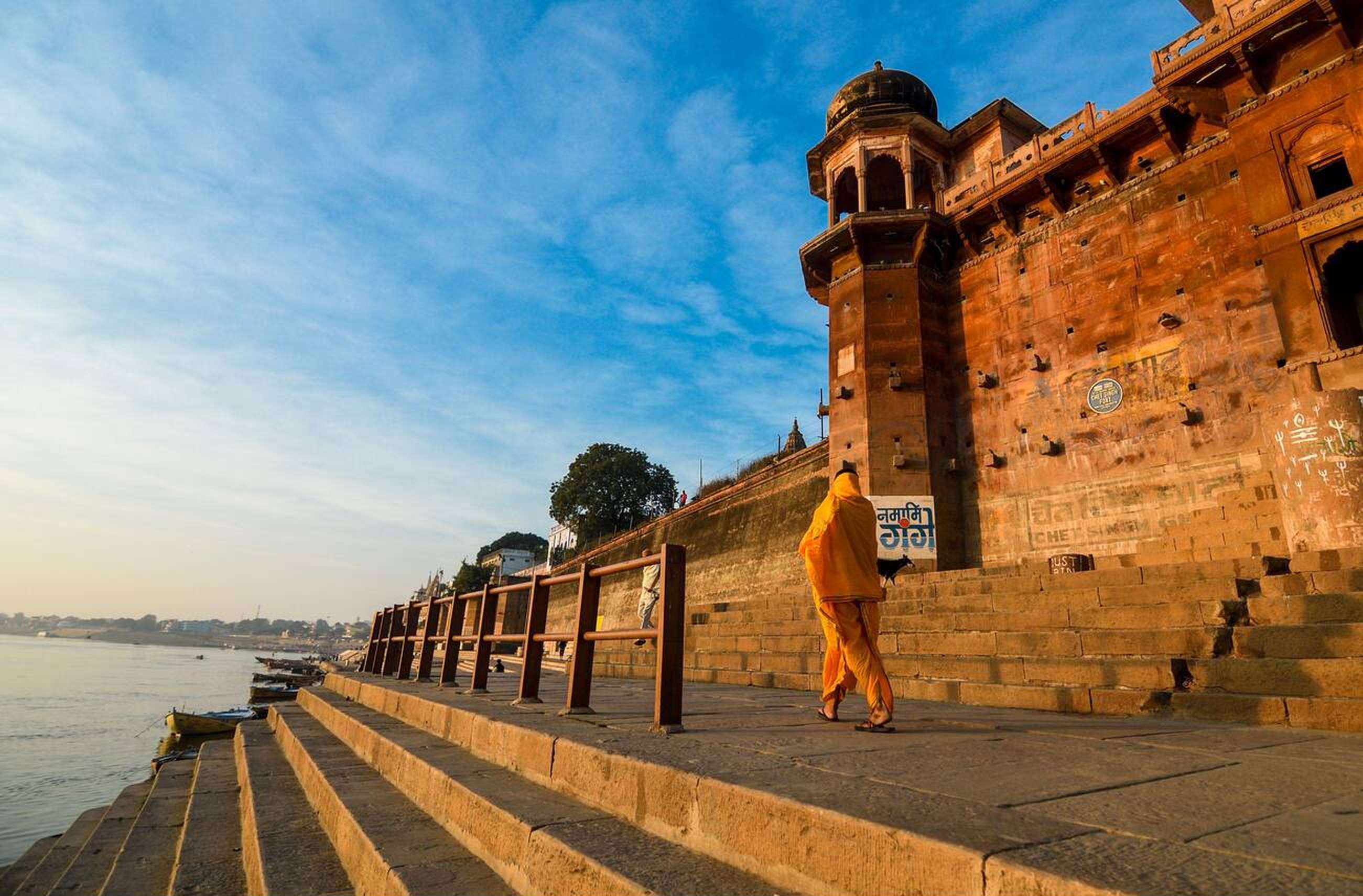 Walk down Ganga Ghats at dawn, capturing timeless beauty