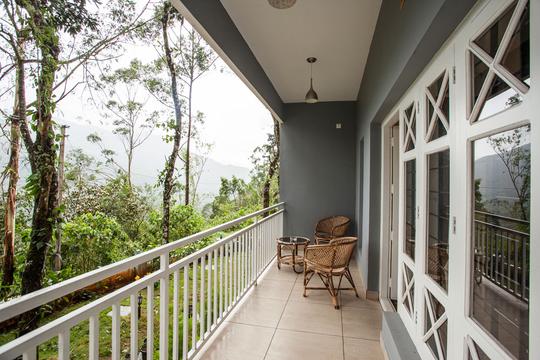 A Hideaway Tucked Amidst Tea Estates of Munnar Image
