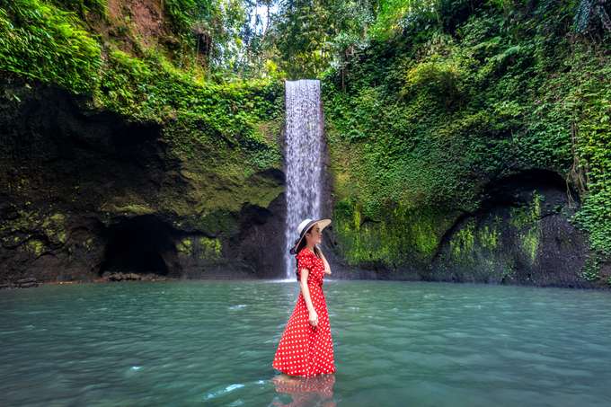 Spend some time in the serene environment of Tibumana Waterfall