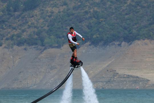 Glide and dive through the air on an epic flyboarding ride