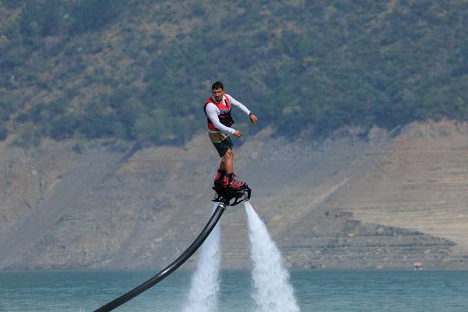 Glide and dive through the air on an epic flyboarding ride