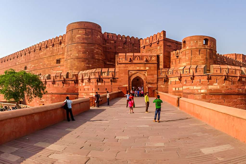 Step into history as you explore the grand halls of Agra Fort, once home to Mughal emperors
