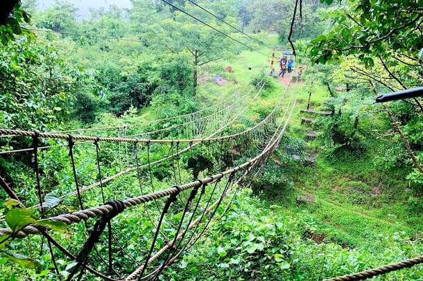 Cross the burma bridge, testing your balance during the combo adventure activity