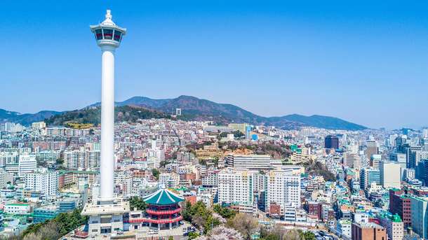 Admire the panoramic view of Busan city from the observatory deck of Busan Tower