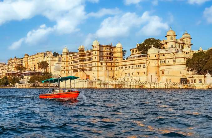 Enjoy a peaceful boat ride on Lake Pichola