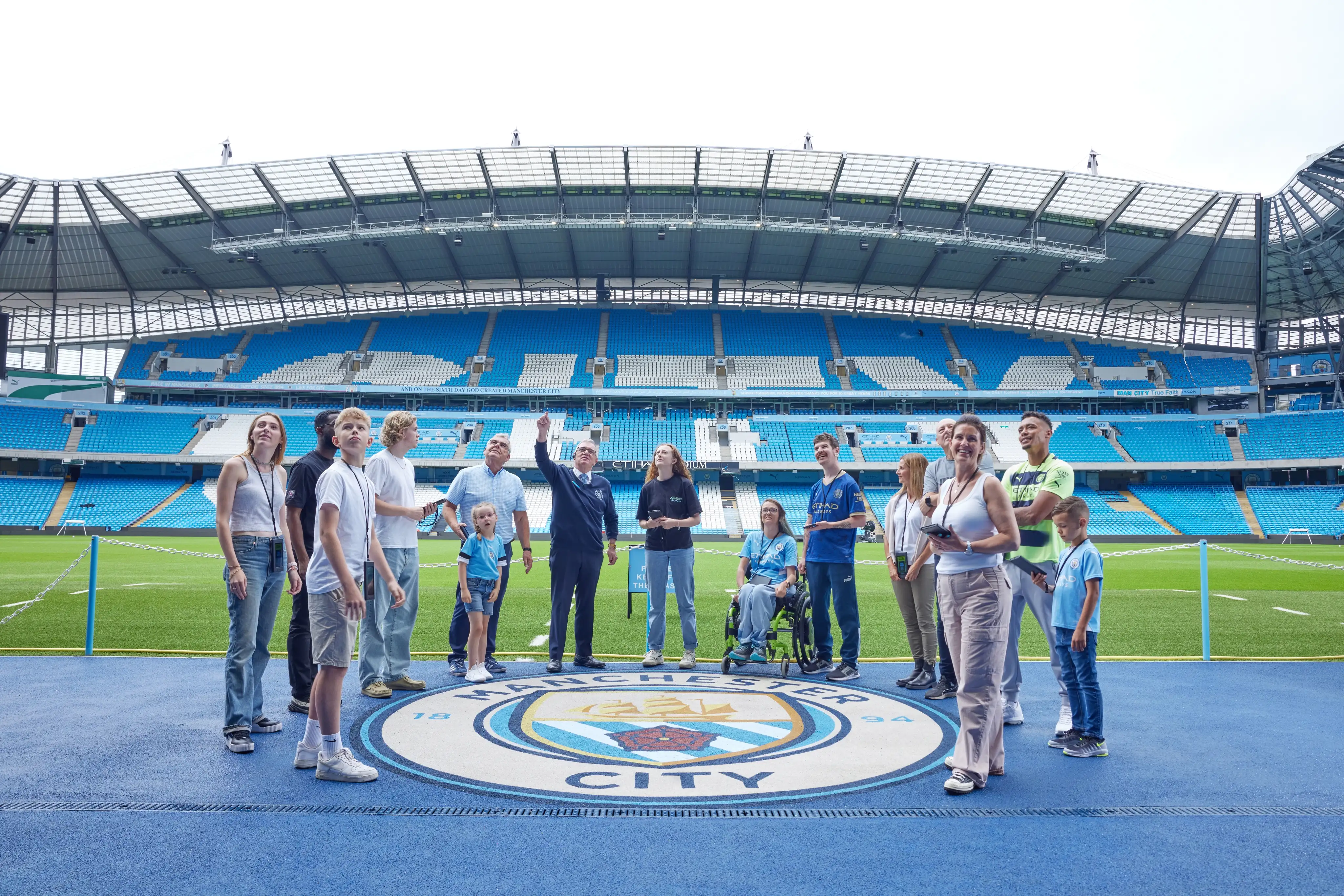 Experience the thrill of standing pitch-side at the Etihad Stadium during the stadium tour
