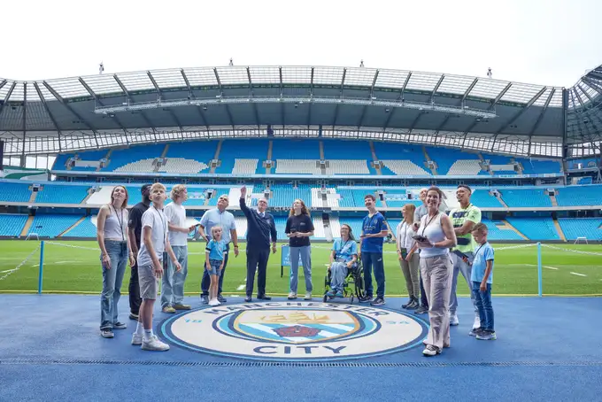 Experience the thrill of standing pitch-side at the Etihad Stadium during the stadium tour
