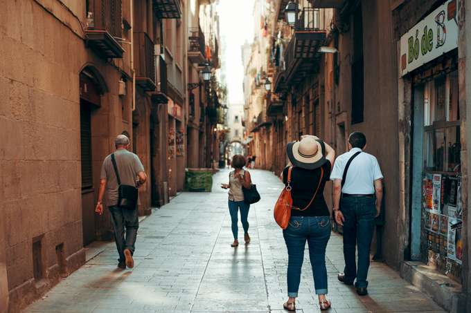 Walk through a vibrant neighborhood filled with trendy boutiques, cafes, and street art