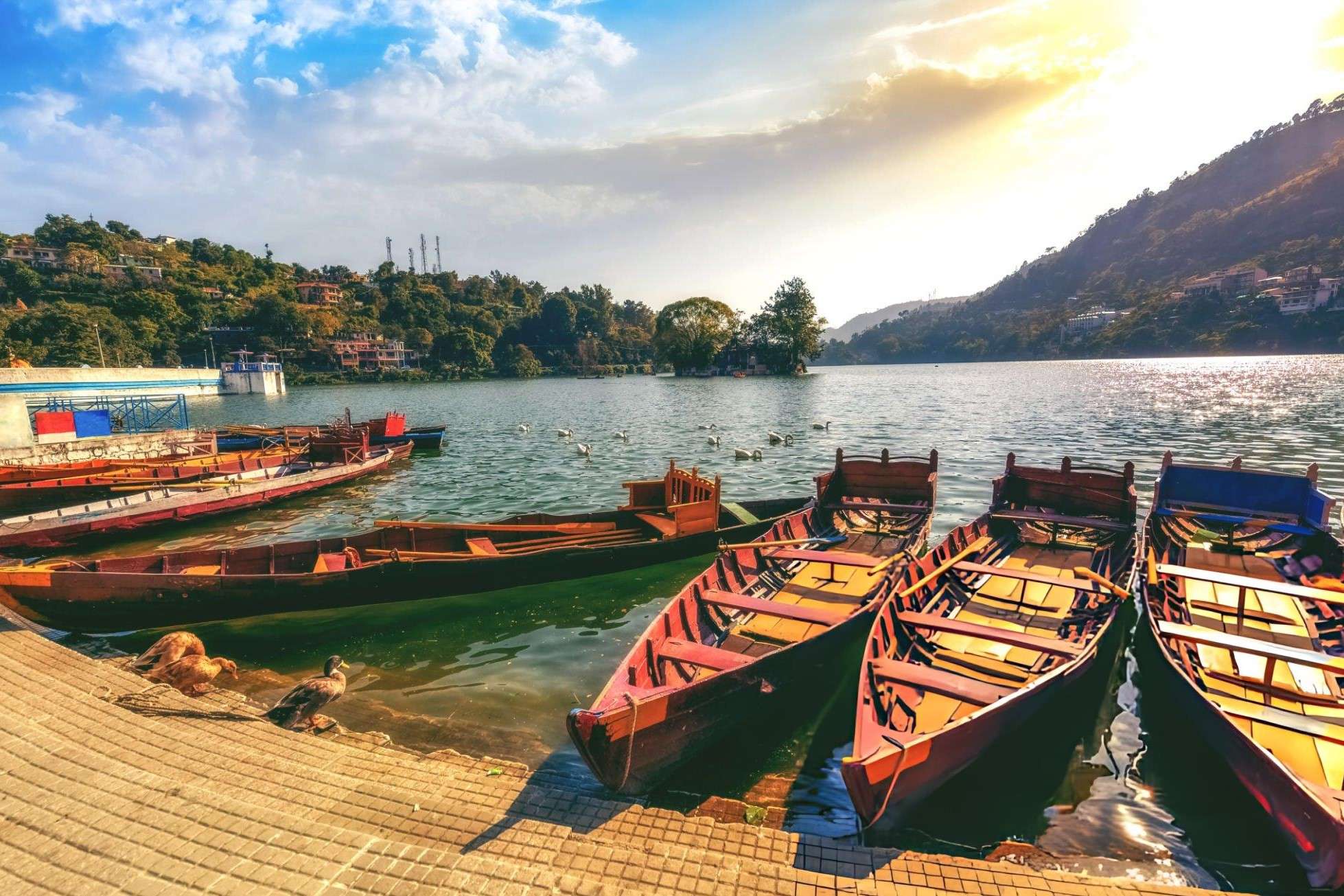 Admire lush hills from your boat during your boating experience in Bhimtal