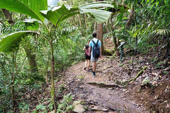 Travelers walking at the Copolia Trail