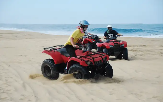 Enjoy stunning ocean views as you race along a beach in Mandarmani