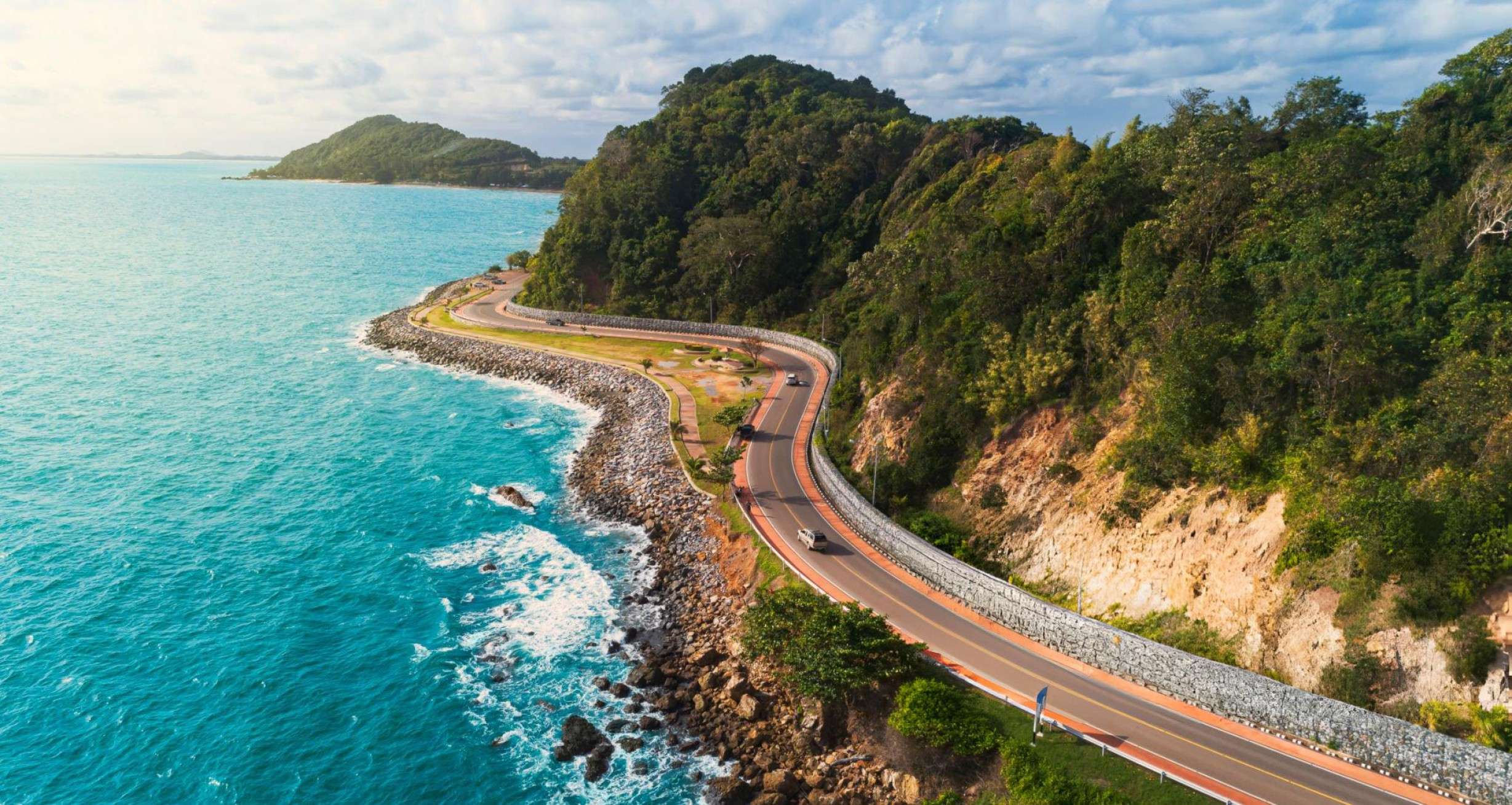 Enjoy a scenic journey along the Great Ocean Road, famed for its winding cliffs and breathtaking ocean views