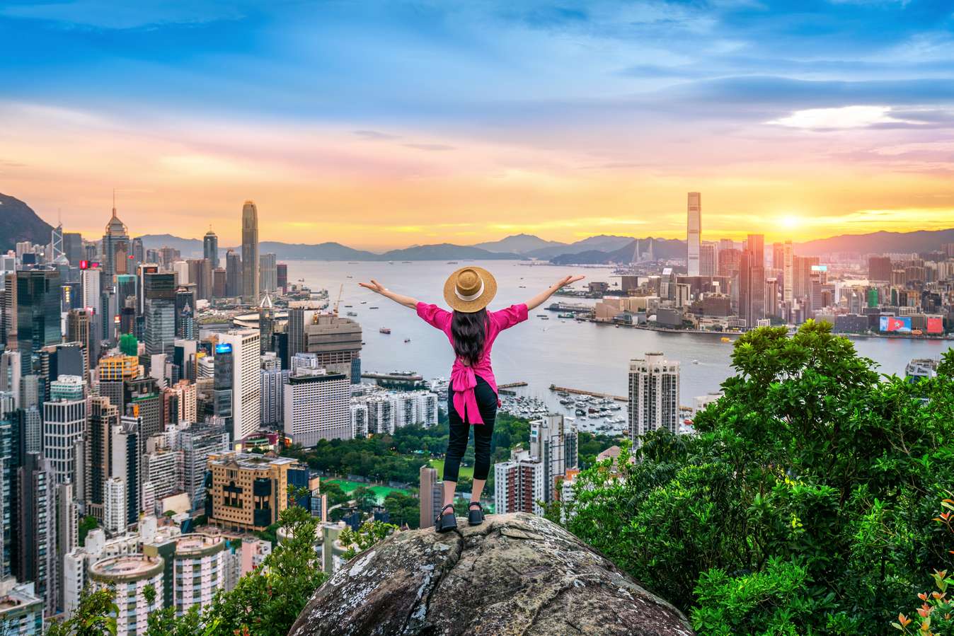 Tourist standing on viewpoint in Hong Kong