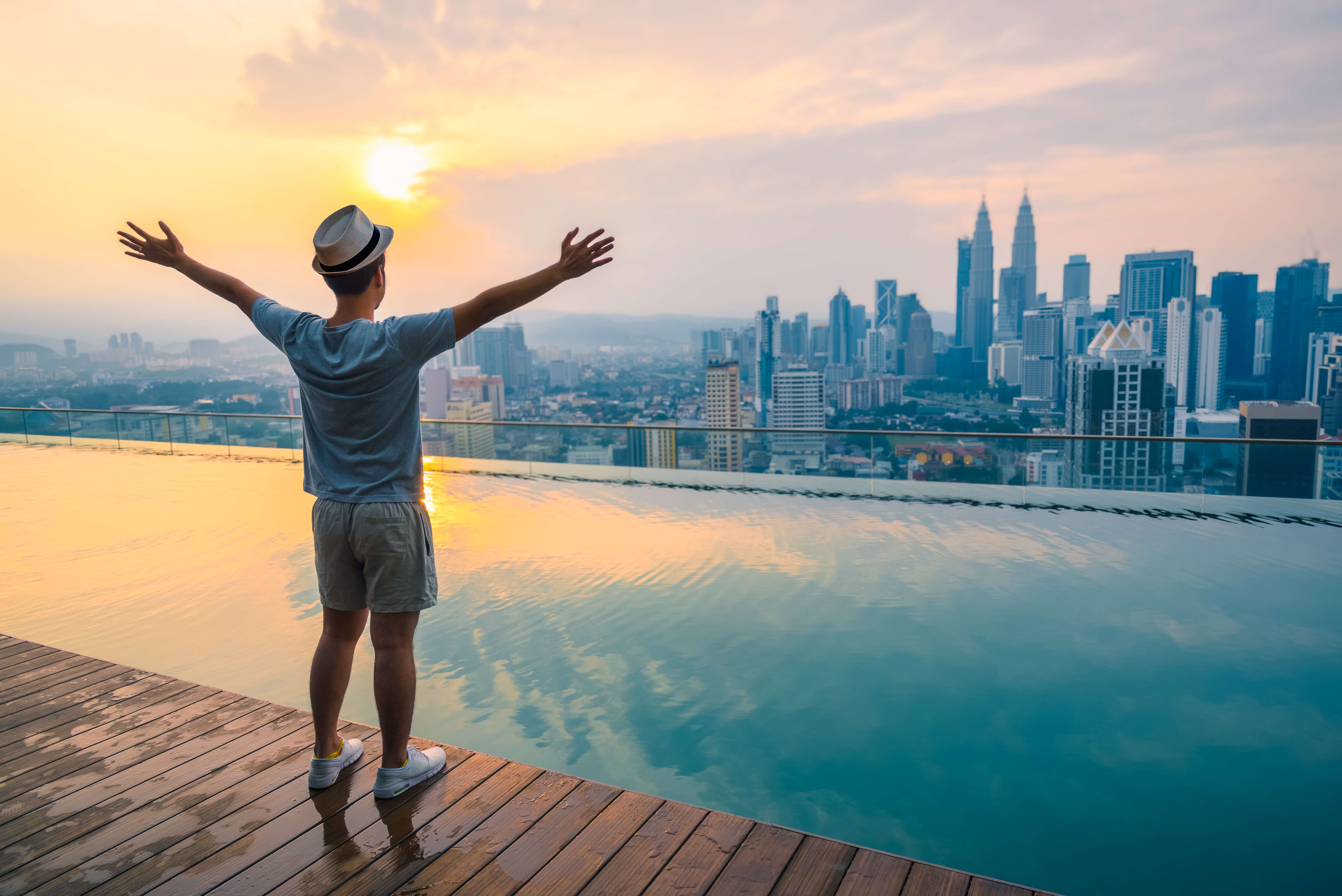 Tourist admiring the skyline of Kuala Lumpur
