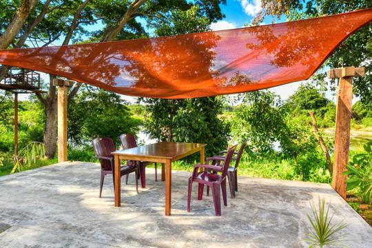 Luxurious Riverside Retreat In Mysore Image