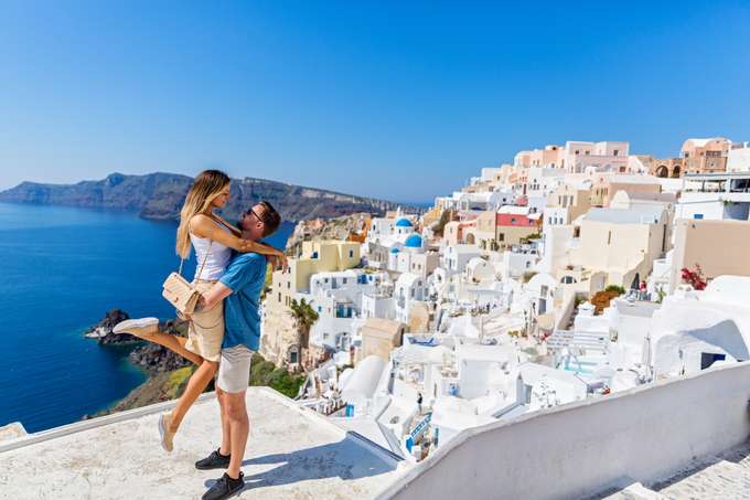 Witness the stunning landscape of the island of Santorini with your partner