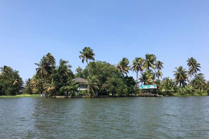 Immerse yourself in the serenity of Punnamada Lake during your 8-hour Alleppey sightseeing tour