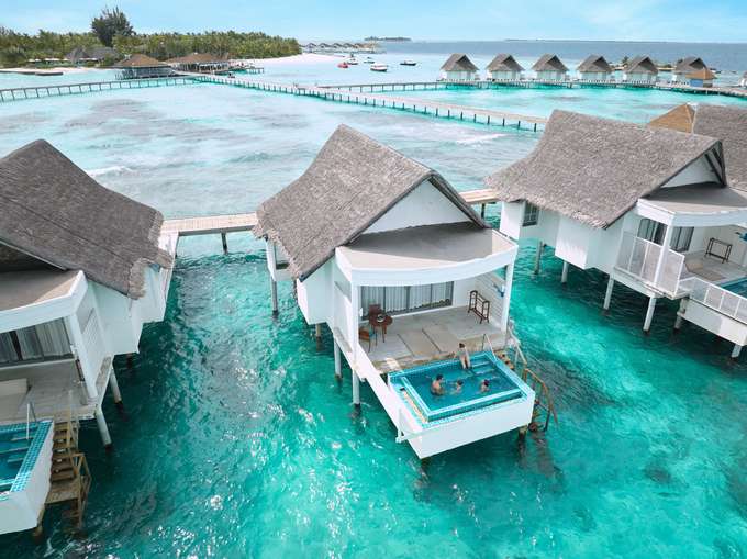 Aerial view of an overwater villa, providing uninterrupted ocean views 