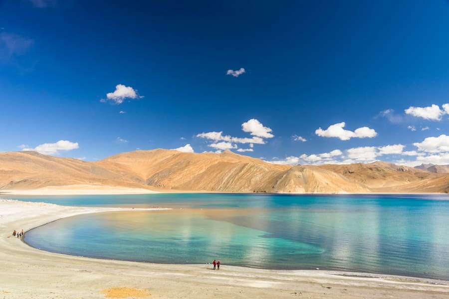 Pangong Lake, situated at a height of almost 4,350m, is the world's highest saltwater lake. Its water, which seems to be dyed in blue, stand in stark contrast to the arid mountains surrounding it.