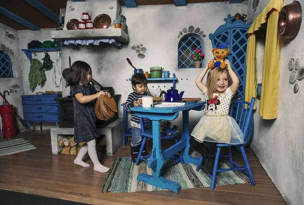 Watch your kids have fun in the life size doll house kitchen