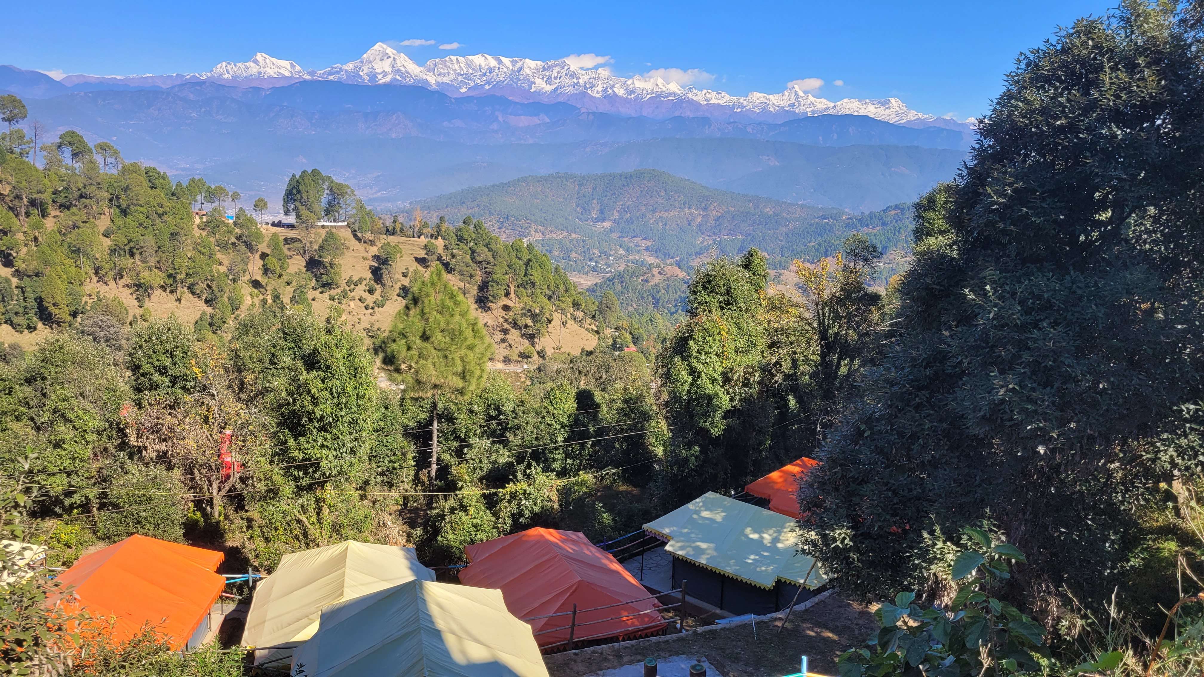 Experience the tranquility of camping amidst Himalayan peaks