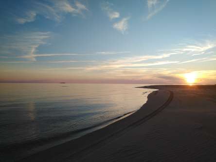 Relax at Ras Alsheikh Hamid bay area witnessing serene sunset