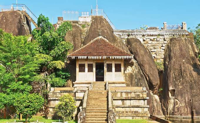 Explore Dambulla cave temple with your companions