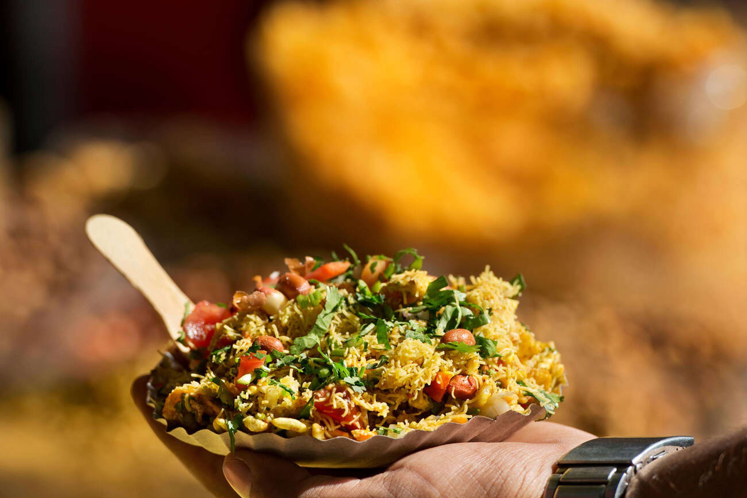 Enjoy the tangy crunch of bhelpuri, a refreshing contrast to rich, traditional Rajasthani flavors