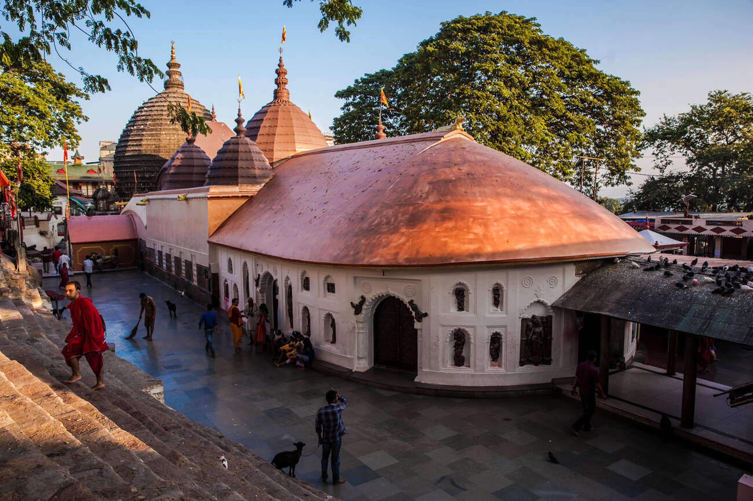 Climb temple steps for breathtaking Brahmaputra views