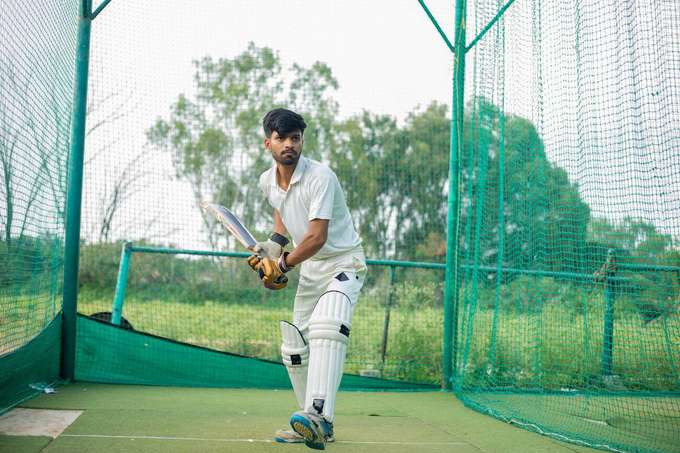 Experience the rush of hitting sixes in a tightly packed cricket pitch