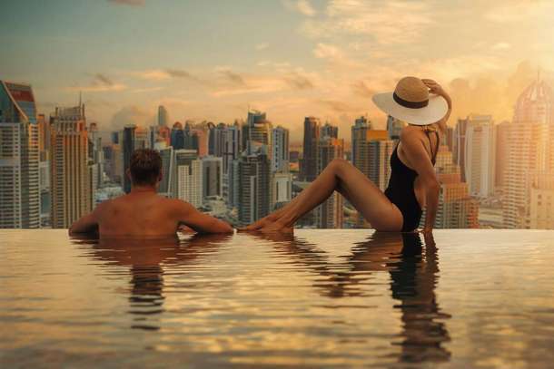 Relax in the swimming pool and marvel at the stunning skyline of Dubai