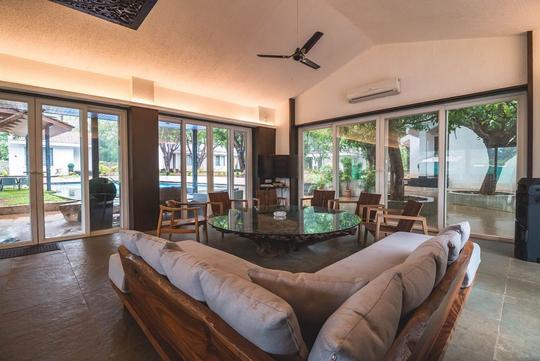 A Luxurious Villa Amidst The Lush Mango Trees In Karjat Image