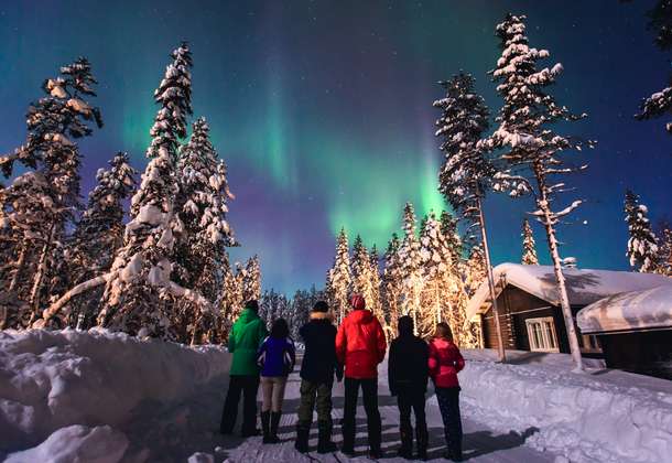 Tourists admiring Northern Lights