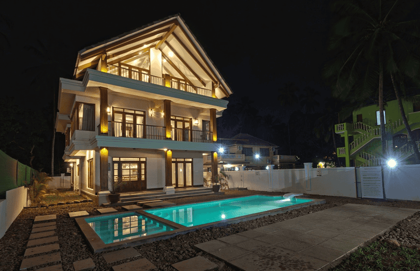 Night view of the façade & the pool