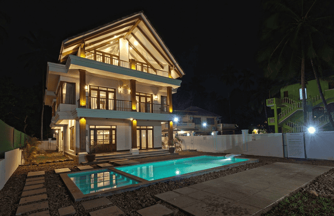 Night view of the façade & the pool