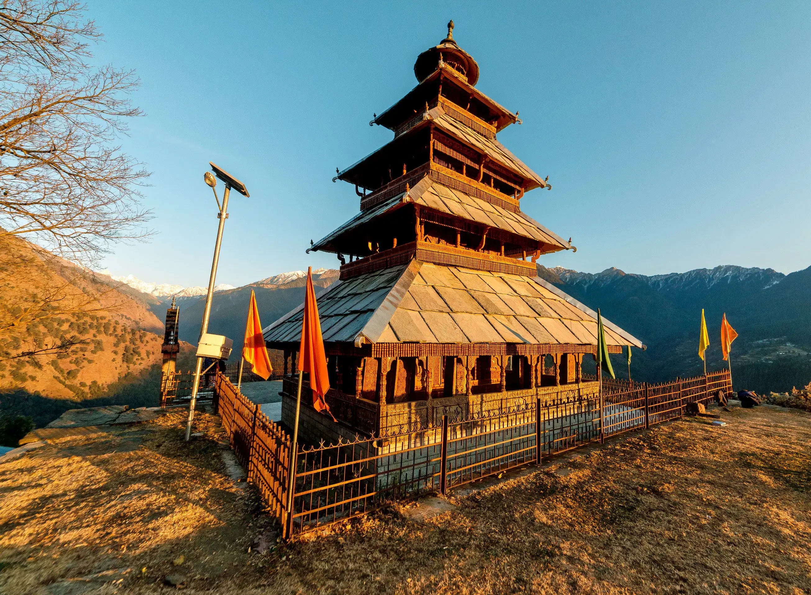 Soak-in the beauty of the Manu Temple surrounded by mountain ranges
