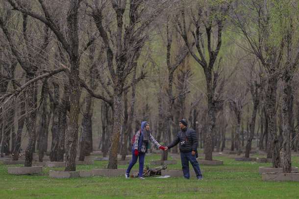 Tourist enjoying scenic view of the Betaab Valley, Kashmir