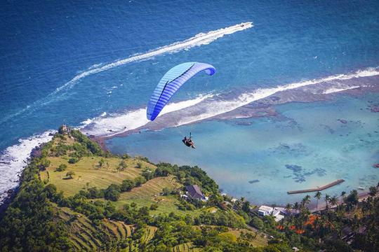 Paragliding in Bali at Timbis Beach Image