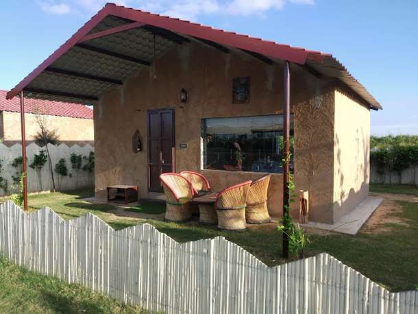 Marvel at the stunning architecture of the house in Yaduvanshi Farm