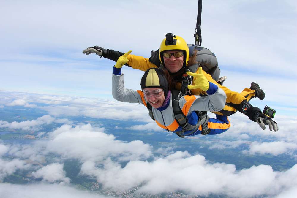 Float 14,000 feet up in the sky as you enjoy Tandem Skydiving