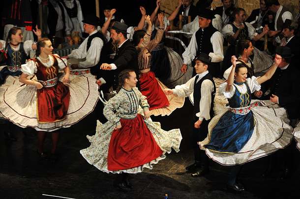 Take a seat & enjoy the beautiful Hungarian folklore show in Budapest