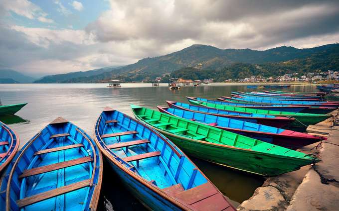 Embark on a 30-minute boat ride across Naini Lake with safety ensured