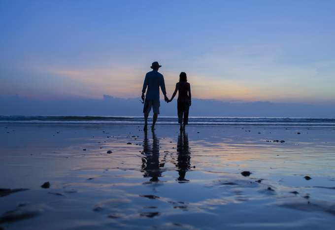 Couple enjoying the scenic view, Kerala