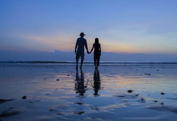Couple enjoying the scenic view, Kerala